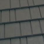 Close-up of gray metal roof shingles