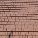 Close-up of brown roof tiles pattern.